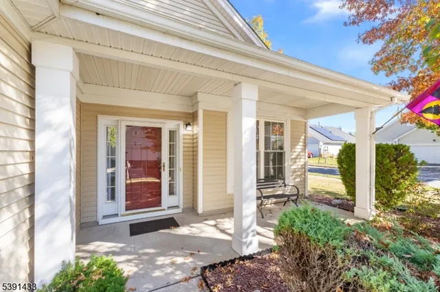 a front view of a house with a porch
