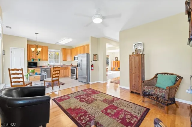 a living room with furniture and a rug