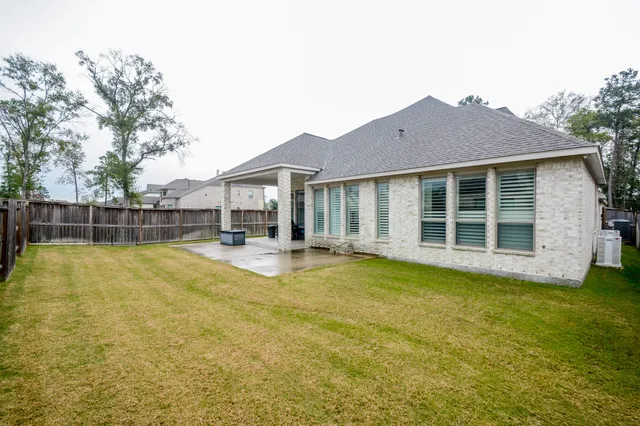 a view of a house with a swimming pool