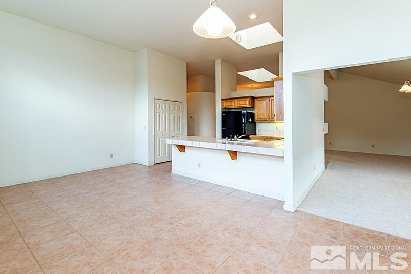 3307 Current Court Reno, NV 89509 - Photo 10 of 19 a view of kitchen with cabinets and outdoor space