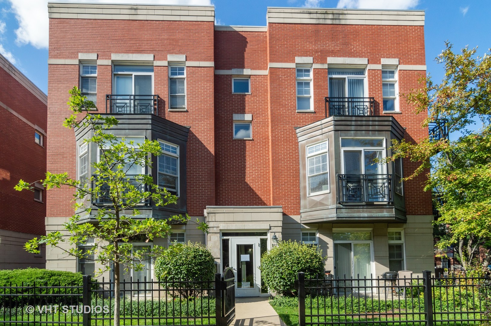 802 West University Lane, Unit 2B Chicago, IL 60608 - Photo 1 of 17 front view of a brick building