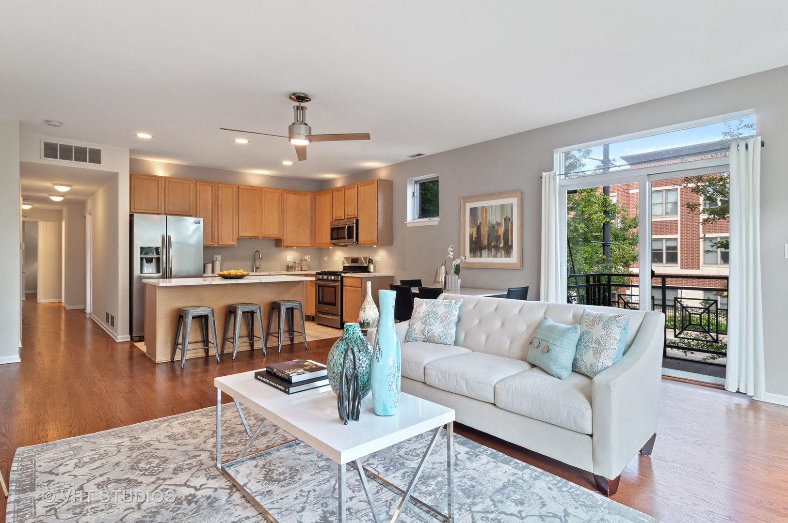 802 West University Lane, Unit 2B Chicago, IL 60608 - Photo 5 of 17 a living room with furniture and kitchen view