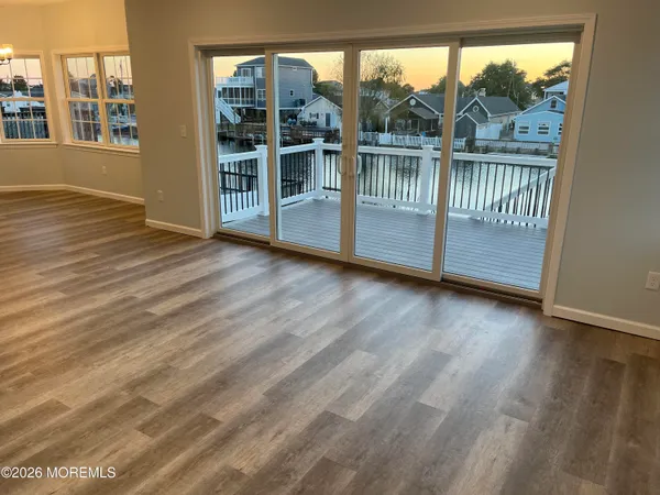 a view of a large window with wooden floor