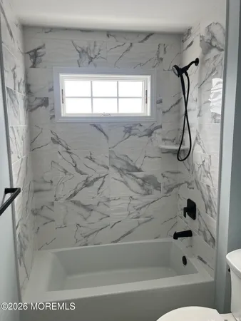 a bathroom with a bathtub