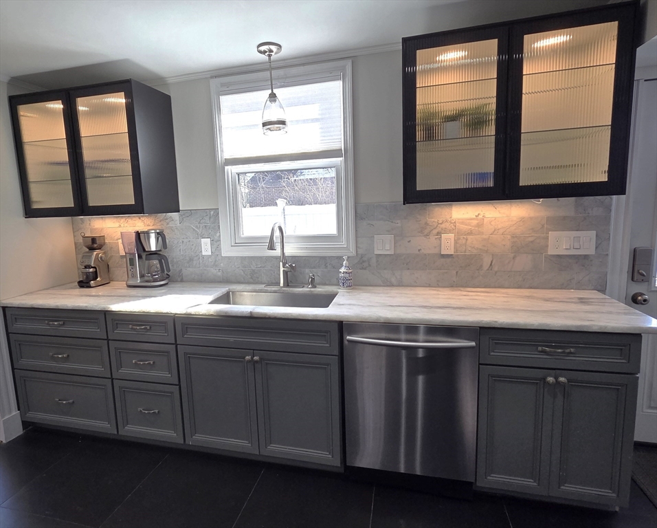 9 Venner Road Arlington, MA 02476 - Photo 4 of 40 a bathroom with a sink and a mirror