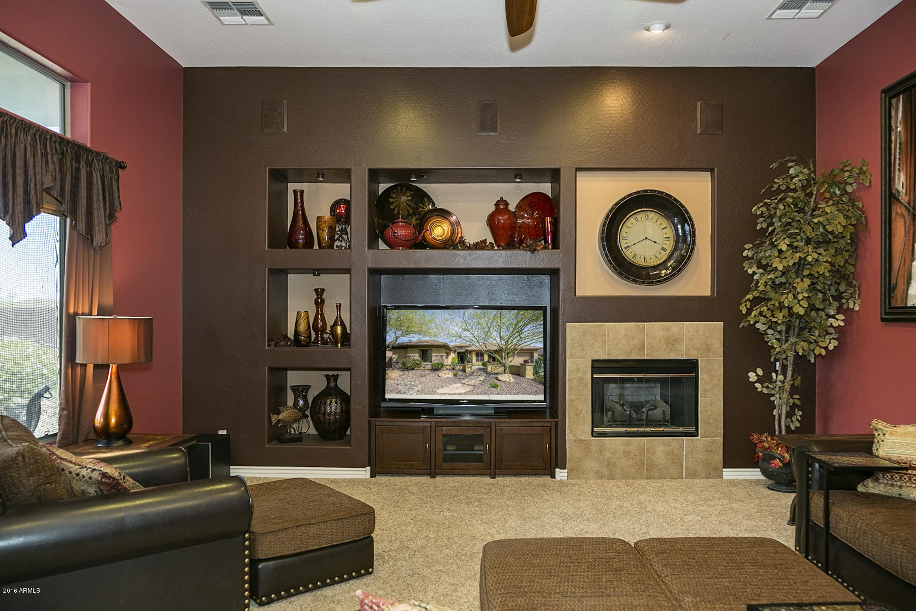 41619 North River Bend Road Anthem, AZ 85086 - Photo 22 of 32 Built in Media Center with Fireplace