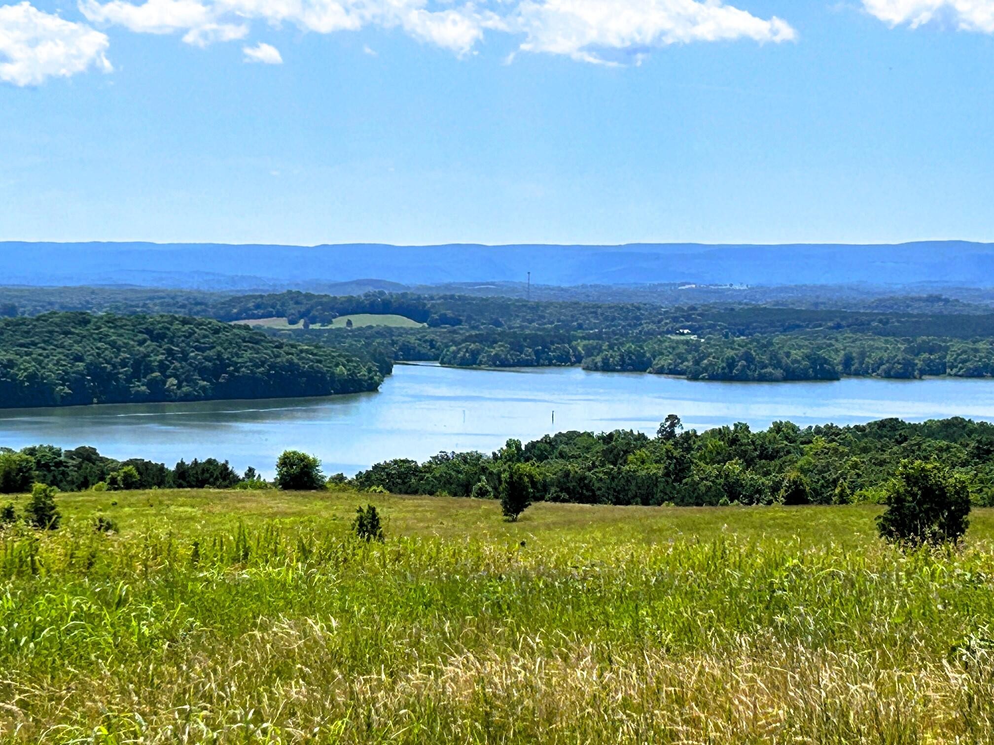 a view of lake and mountain