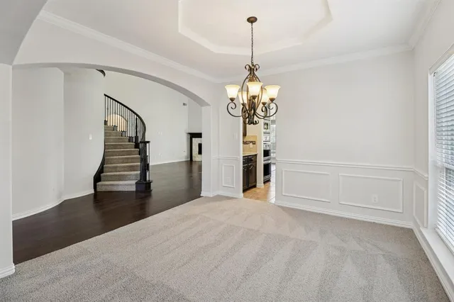 a view of a livingroom with a staircase