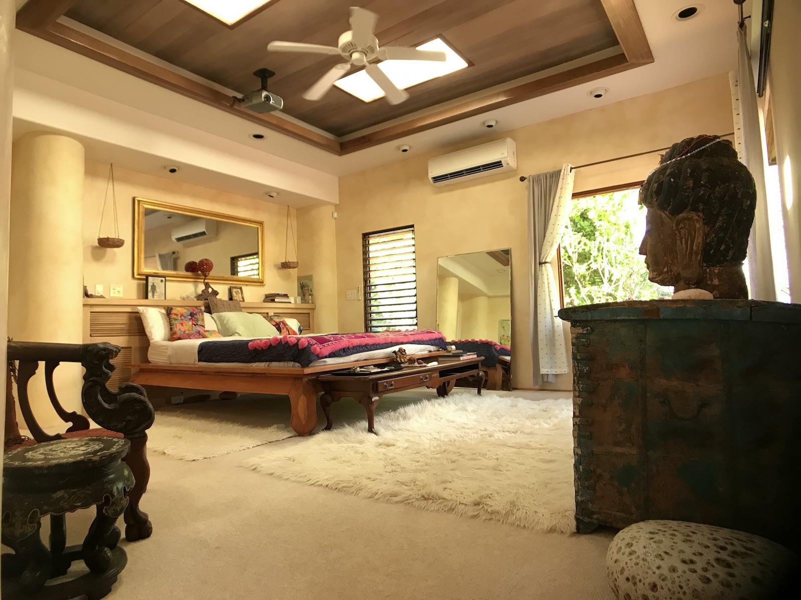 107 West Kuiaha Road Haiku, HI 96708 - Photo 11 of 49 a living room with furniture and a flat screen tv