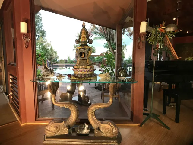 a view of swimming pool with a outdoor seating