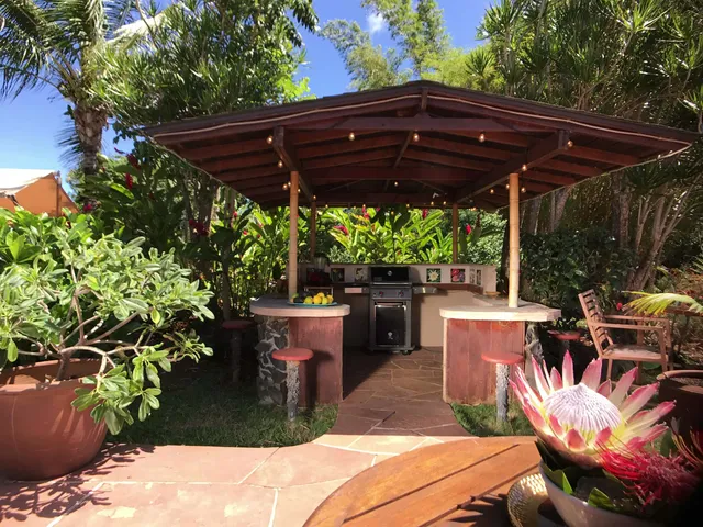 a patio with water table and chairs