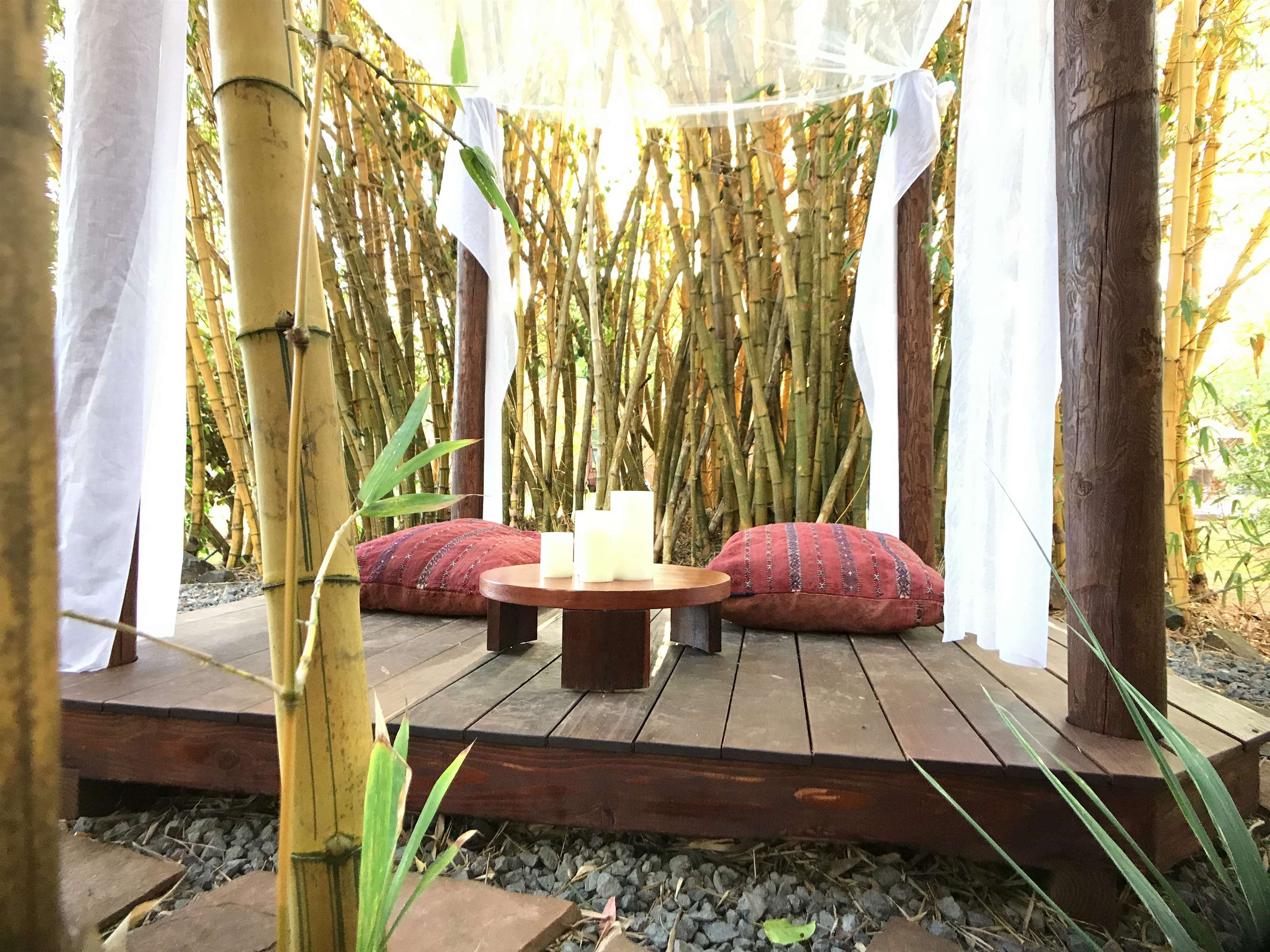 107 West Kuiaha Road Haiku, HI 96708 - Photo 40 of 49 a living room with a couch and large windows