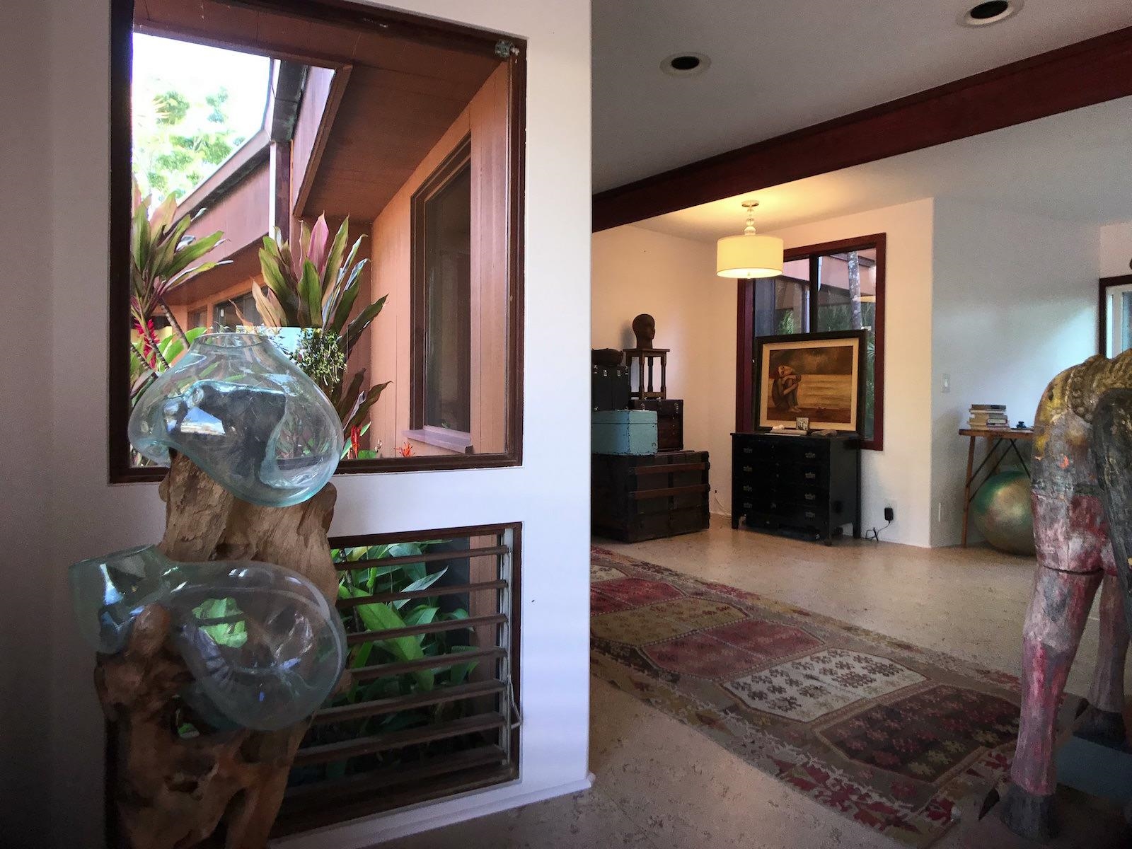 107 West Kuiaha Road Haiku, HI 96708 - Photo 9 of 49 a dining room filled with furniture and a fireplace