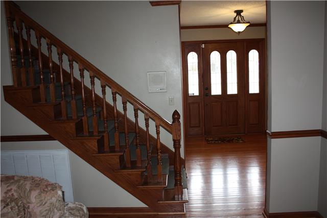 711 3rd Avenue West Springfield, TN 37172 - Photo 11 of 16 a view of entryway and hall with wooden floor