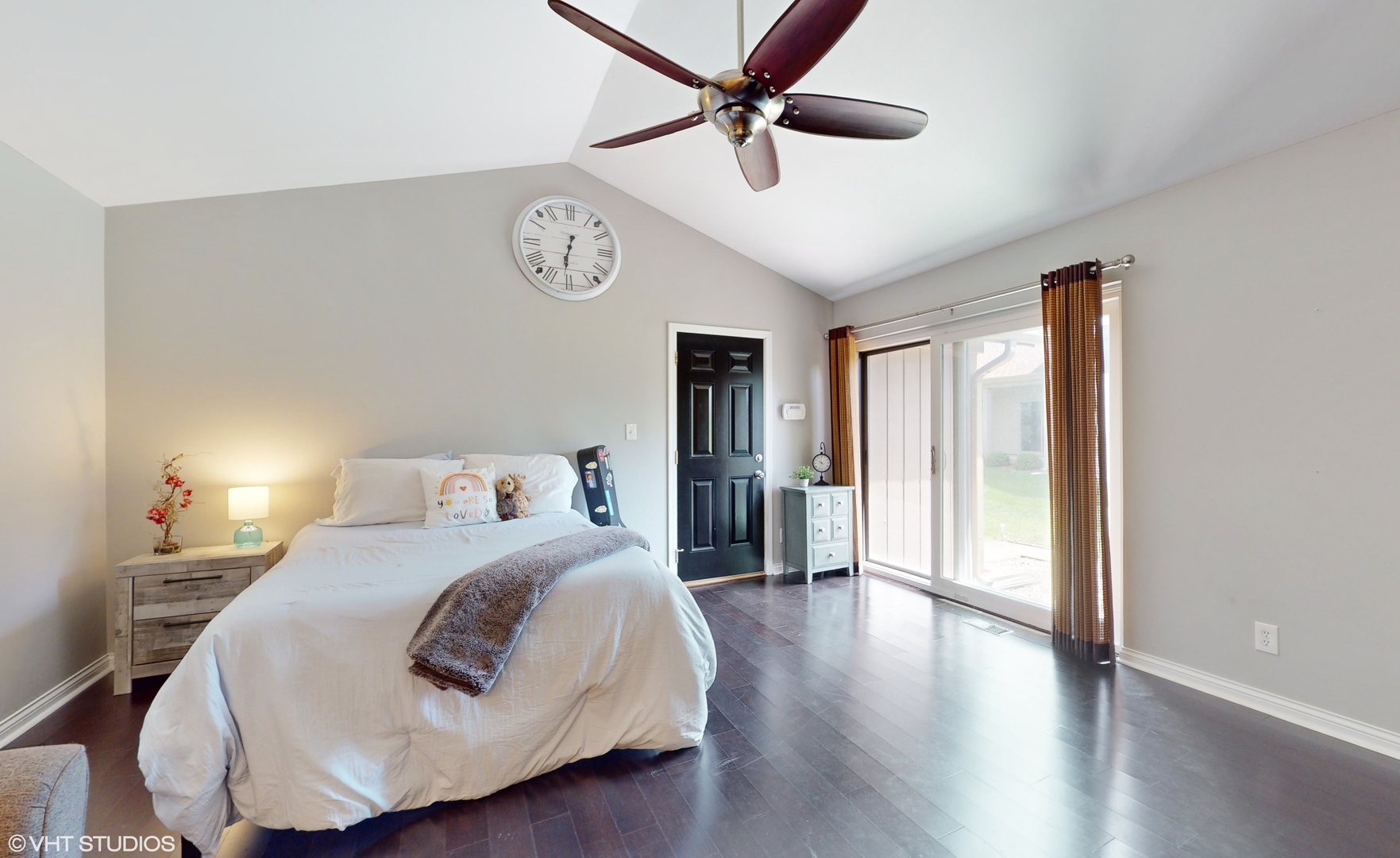 4213 White Ash Road Crystal Lake, IL 60014 - Photo 16 of 43 a bedroom with a bed and a chandelier