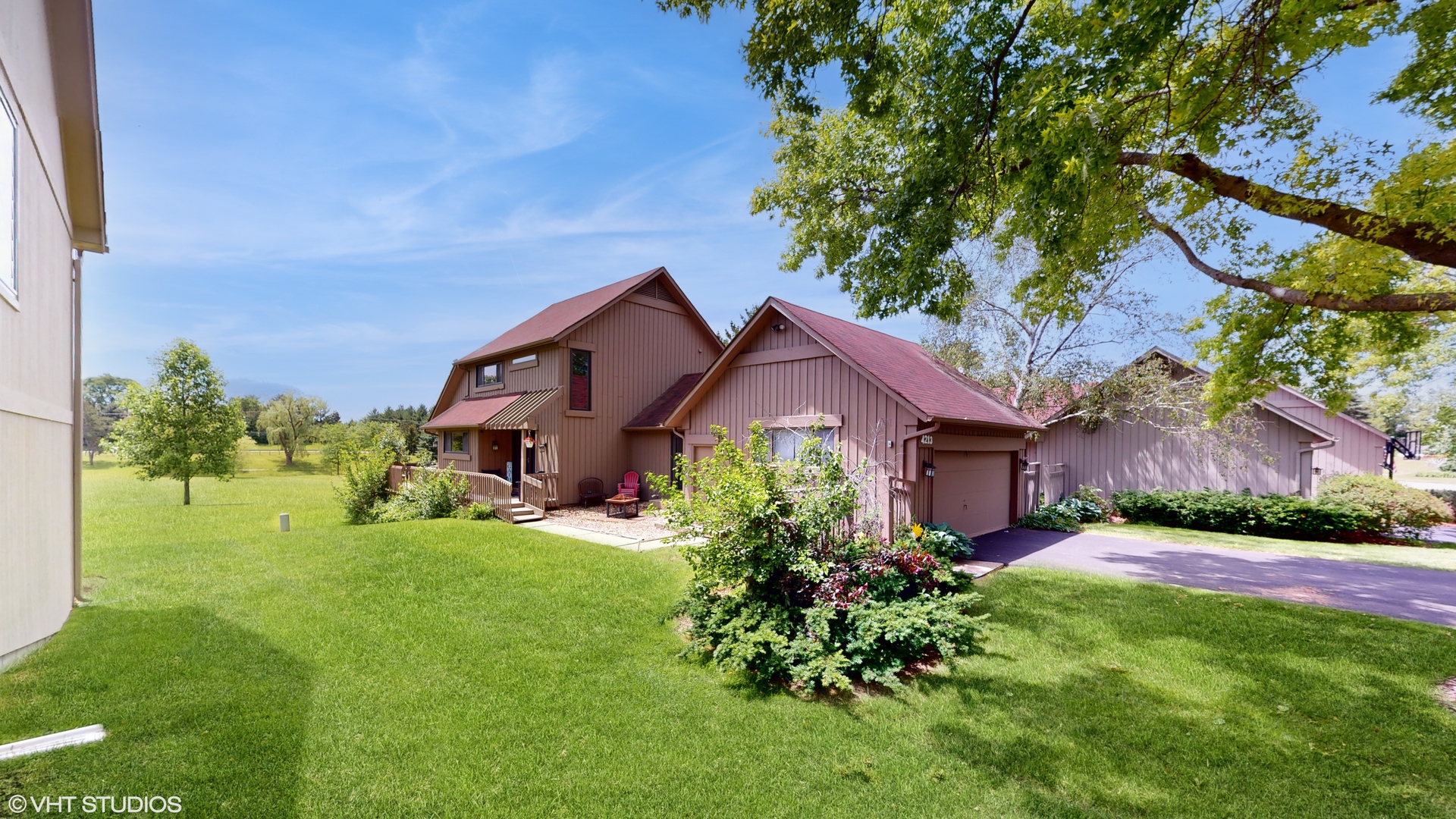 4213 White Ash Road Crystal Lake, IL 60014 - Photo 2 of 43 a front view of a house with a yard
