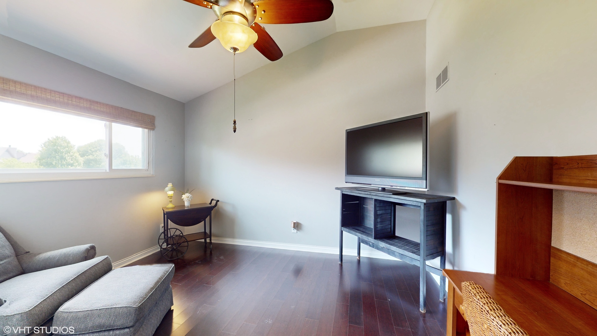 4213 White Ash Road Crystal Lake, IL 60014 - Photo 22 of 43 a living room with furniture and a flat screen tv