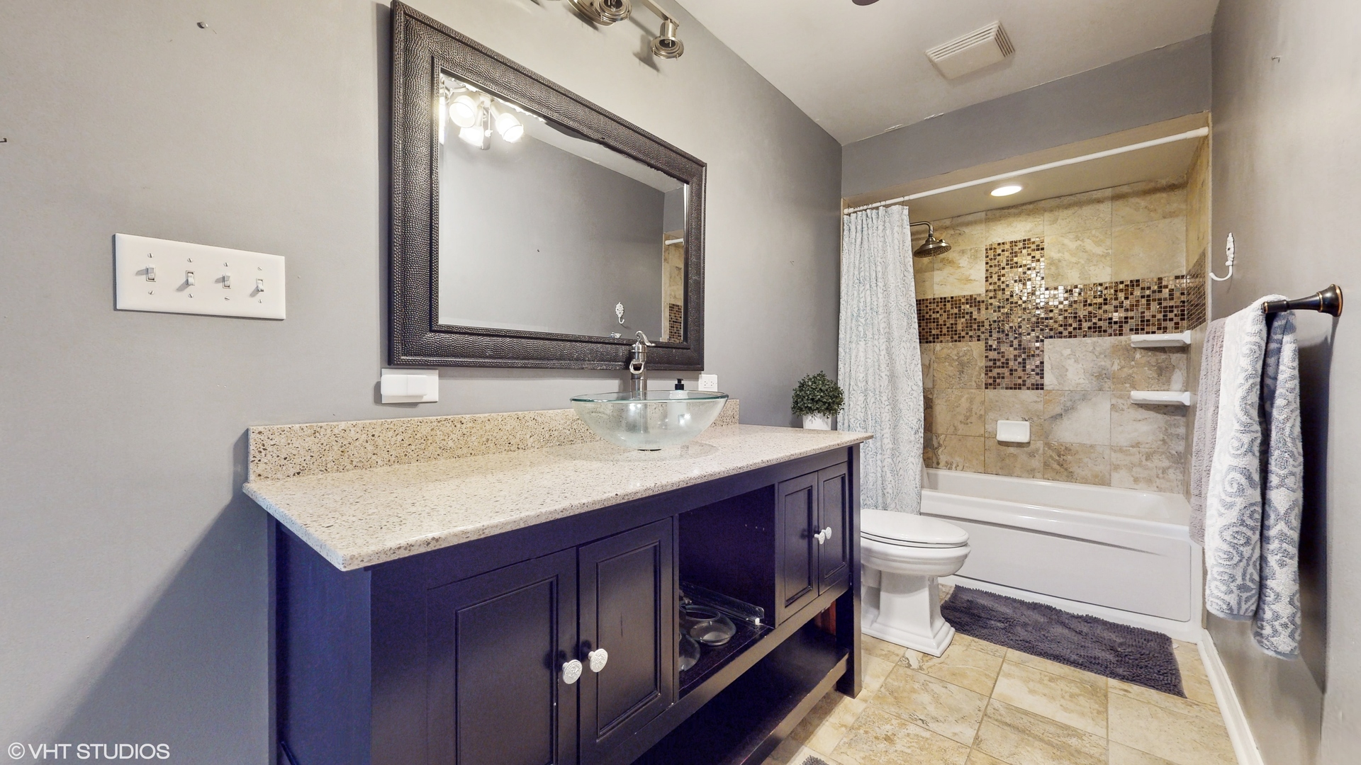 4213 White Ash Road Crystal Lake, IL 60014 - Photo 24 of 43 a bathroom with a granite countertop sink toilet and shower