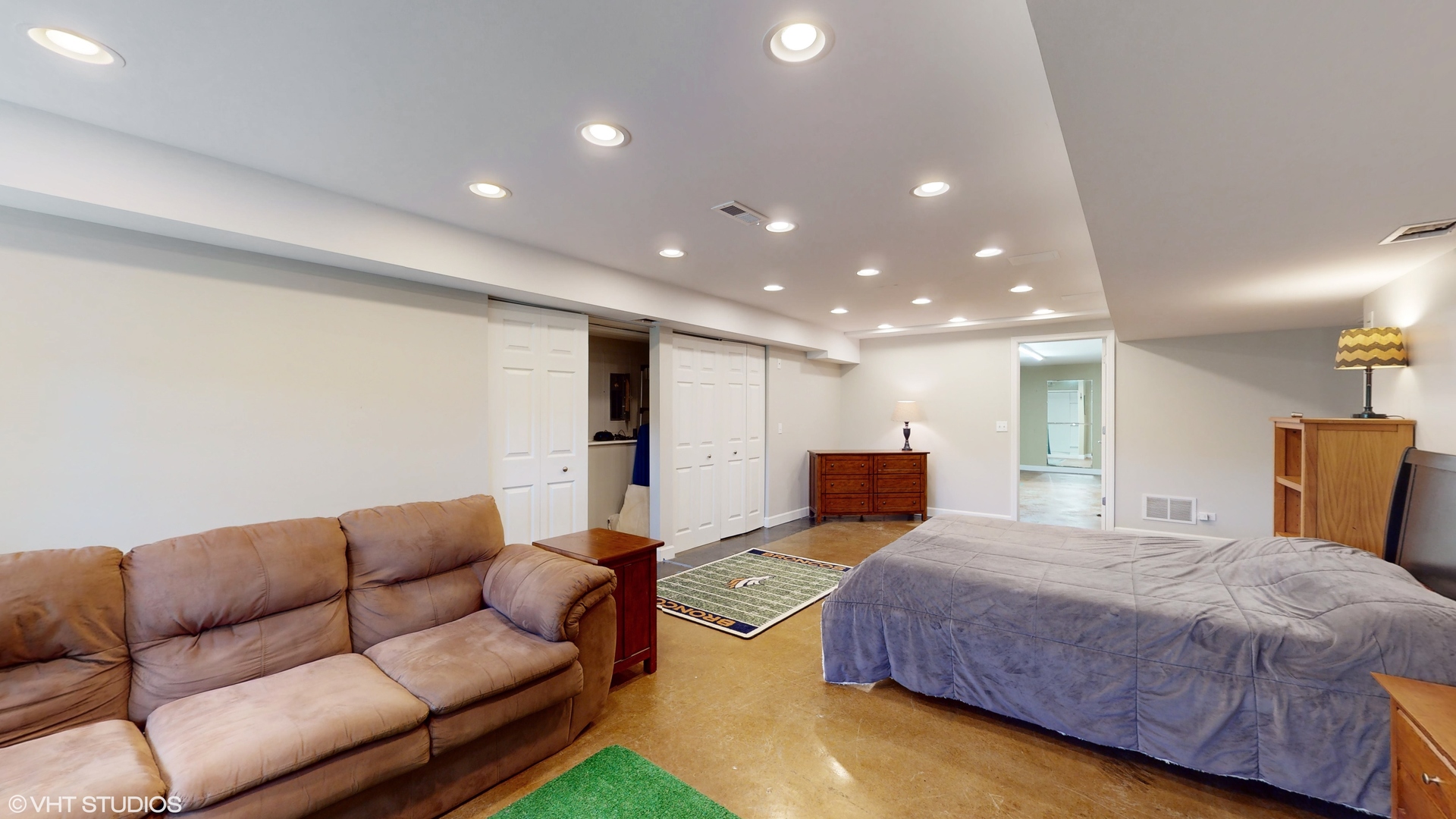 4213 White Ash Road Crystal Lake, IL 60014 - Photo 28 of 43 a spacious bedroom with a bed and couch