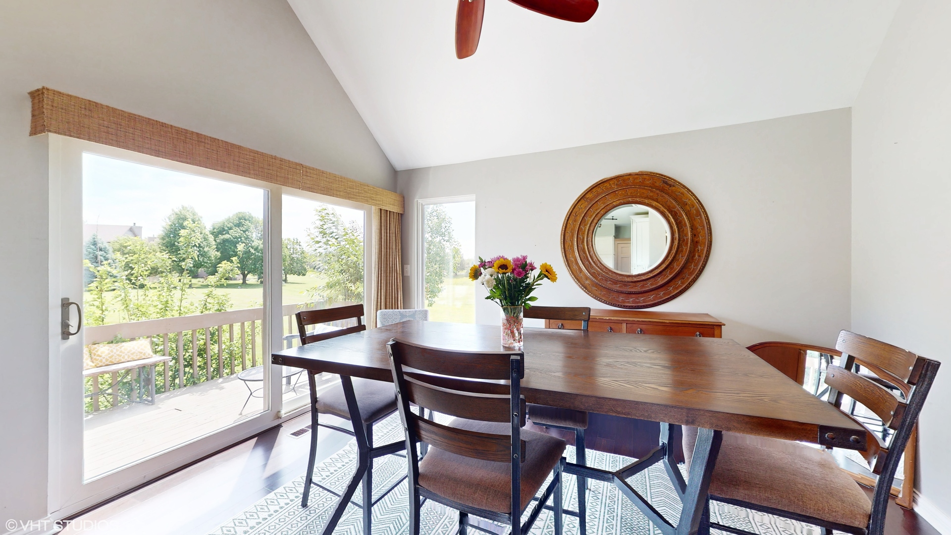 4213 White Ash Road Crystal Lake, IL 60014 - Photo 7 of 43 a dining room with furniture and a mirror