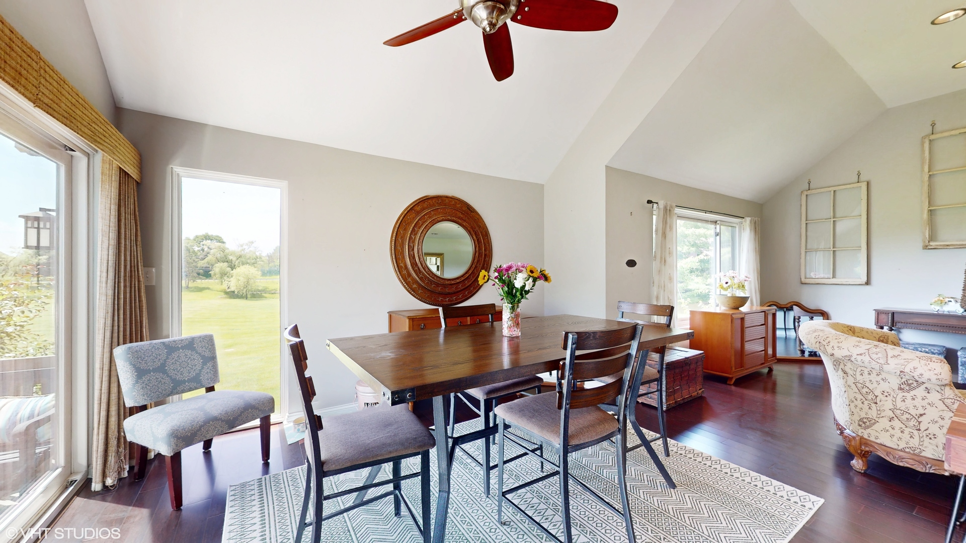 4213 White Ash Road Crystal Lake, IL 60014 - Photo 8 of 43 a dining room with furniture a window and wooden floor