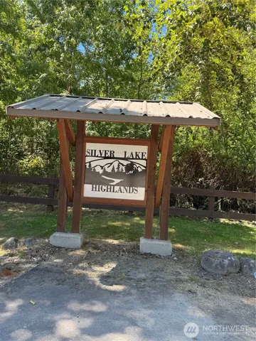 a sign on the side of the road