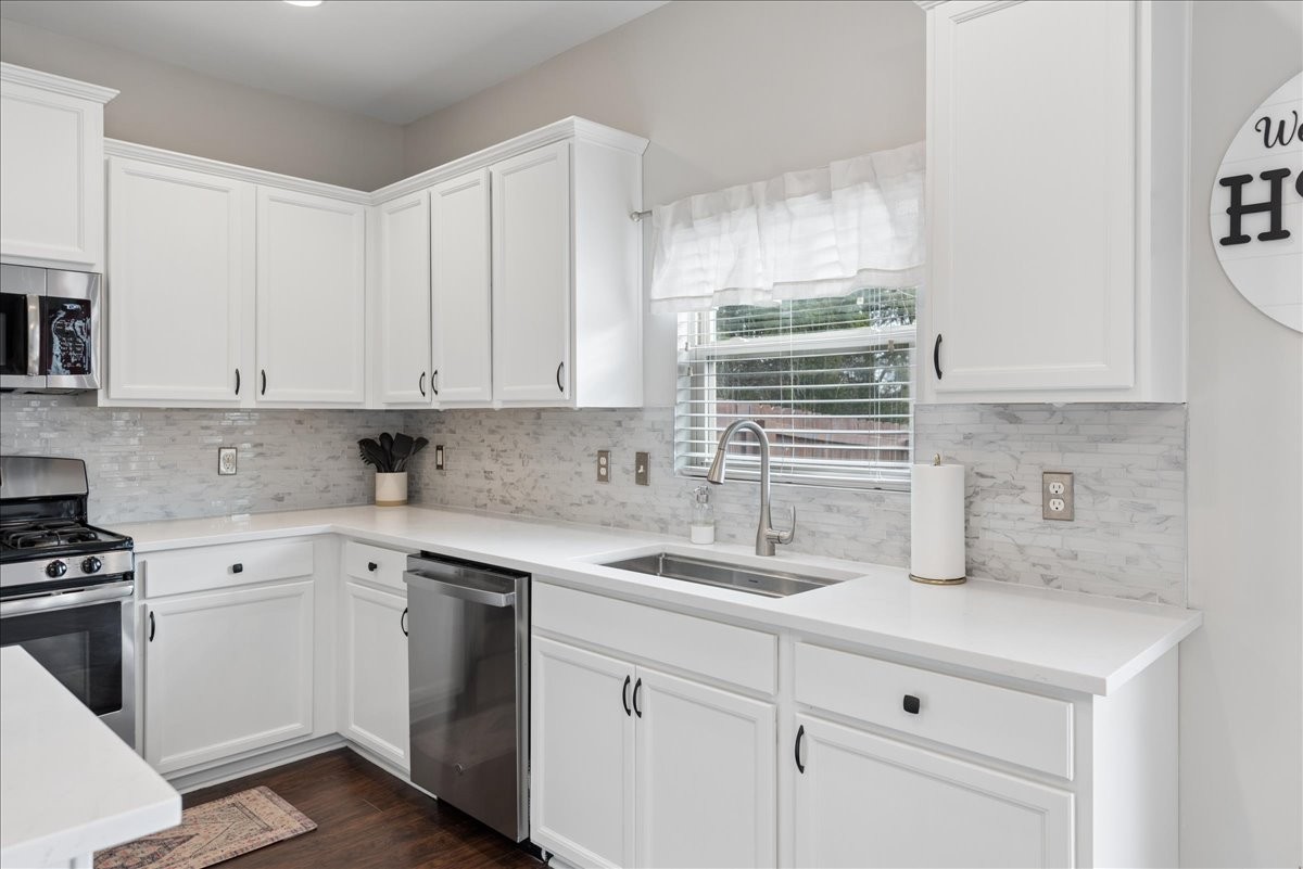 960 Morning Road Antioch, TN 37013 - Photo 11 of 36 a kitchen with cabinets appliances a sink and a microwave