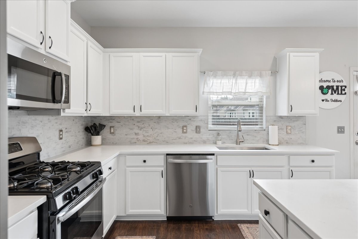 960 Morning Road Antioch, TN 37013 - Photo 12 of 36 a kitchen with cabinets stainless steel appliances a sink and a window