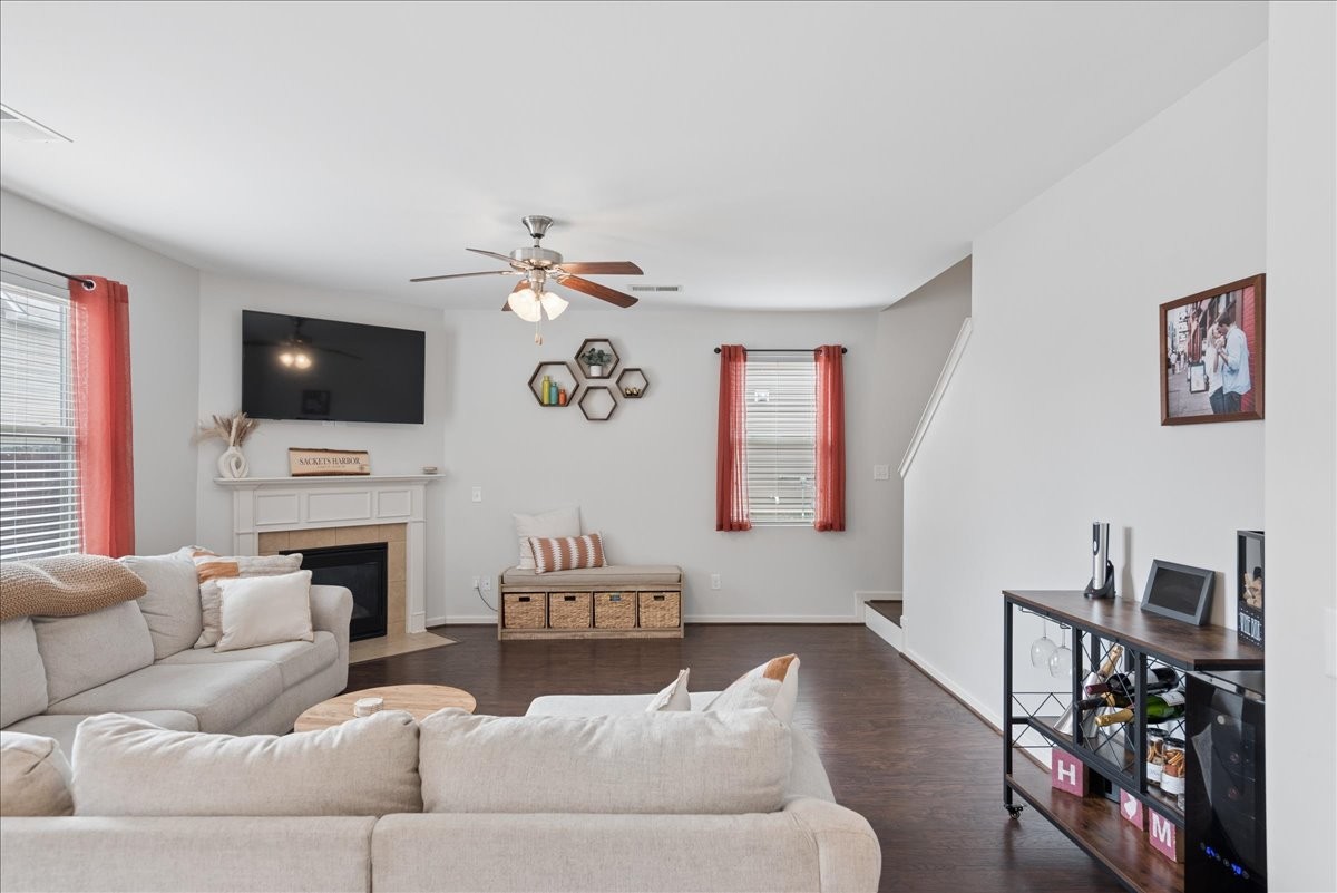960 Morning Road Antioch, TN 37013 - Photo 15 of 36 a living room with furniture a flat screen tv and a fireplace