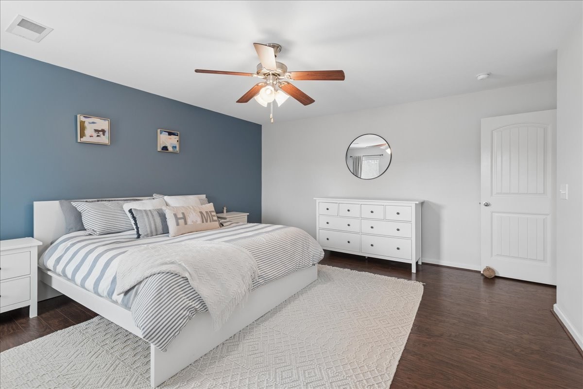 960 Morning Road Antioch, TN 37013 - Photo 19 of 36 a bedroom with a bed and a chandelier