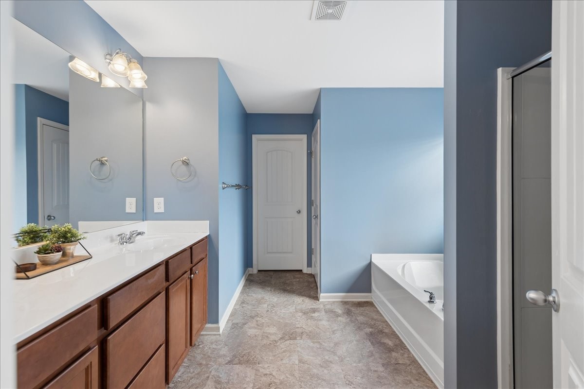 960 Morning Road Antioch, TN 37013 - Photo 20 of 36 a bathroom with a sink a vanity and a mirror