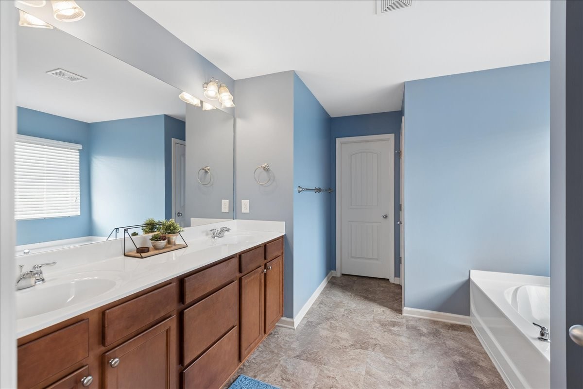 960 Morning Road Antioch, TN 37013 - Photo 21 of 36 a bathroom with a sink and a mirror