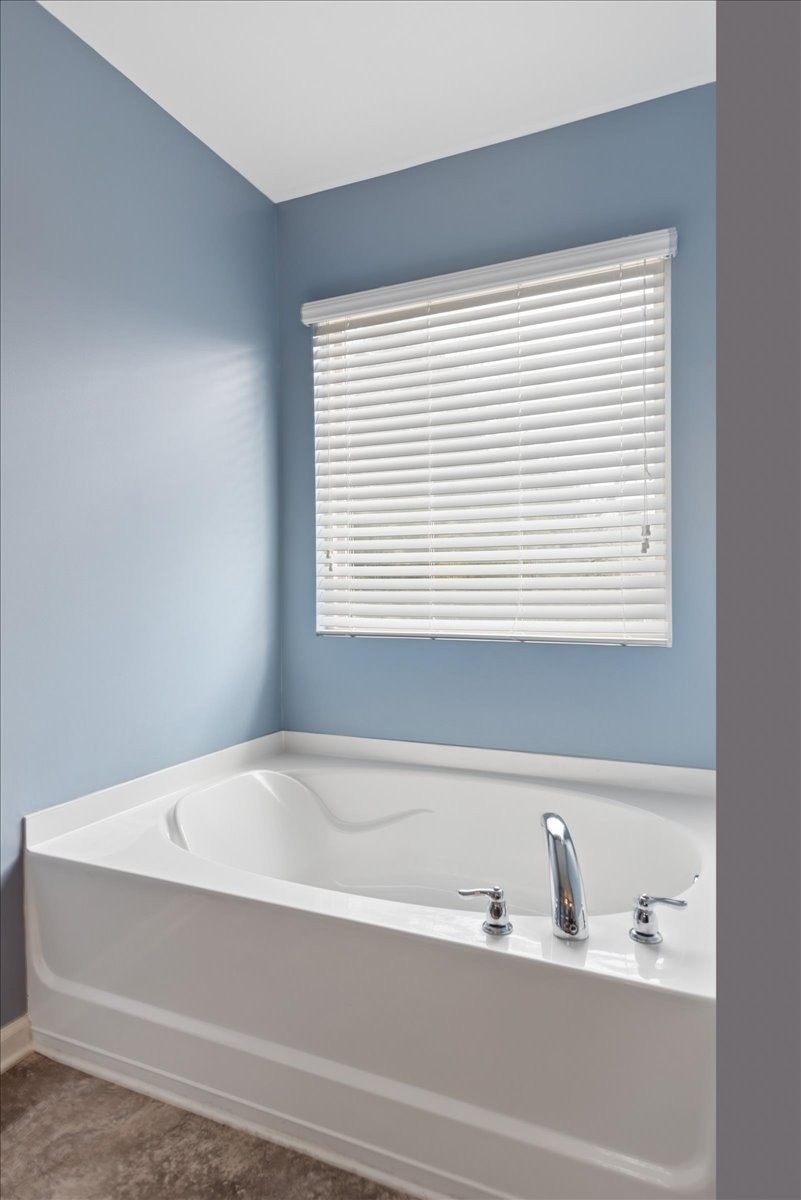 960 Morning Road Antioch, TN 37013 - Photo 24 of 36 a bathroom with a bathtub and next to a window