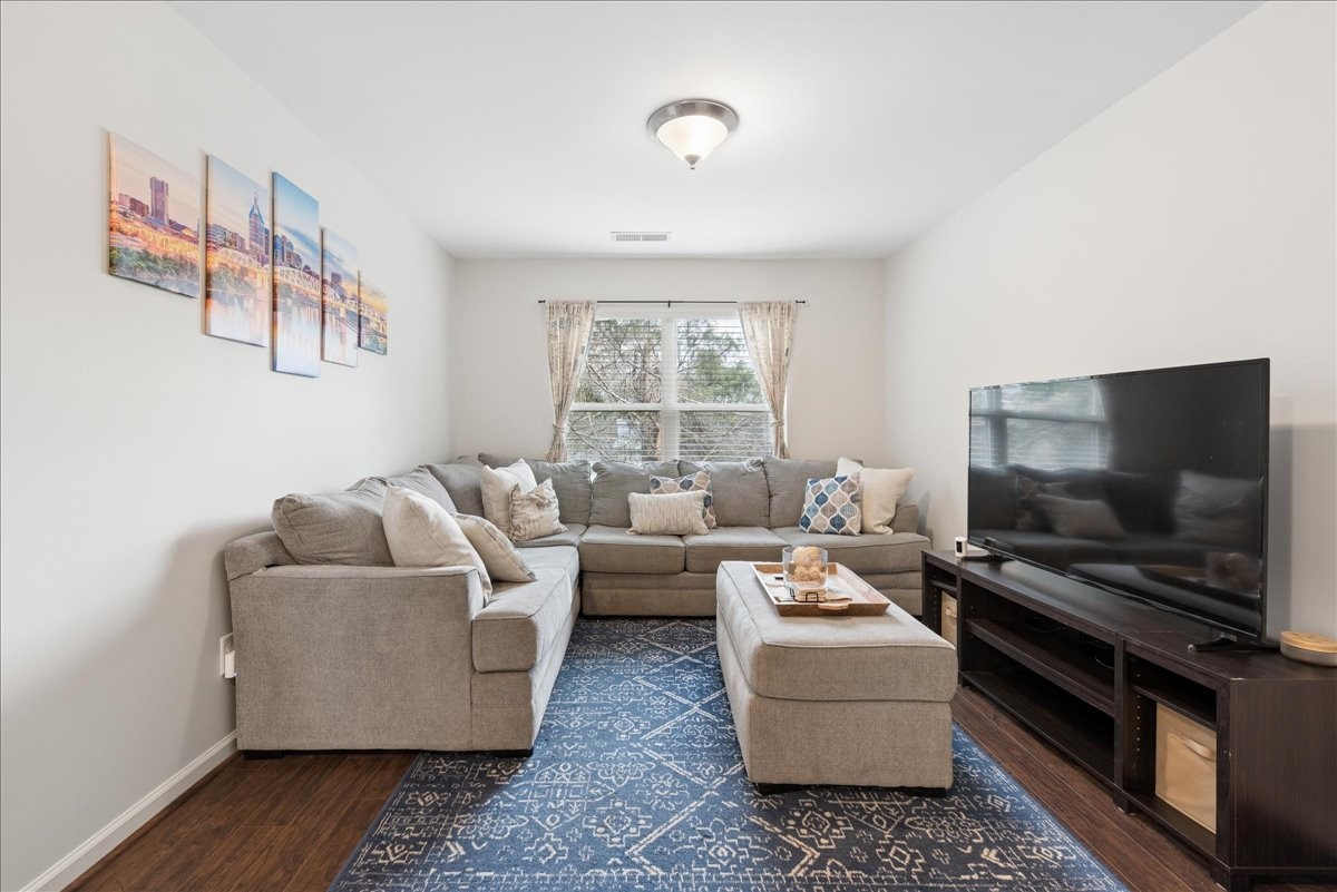 960 Morning Road Antioch, TN 37013 - Photo 29 of 36 a living room with furniture and a flat screen tv