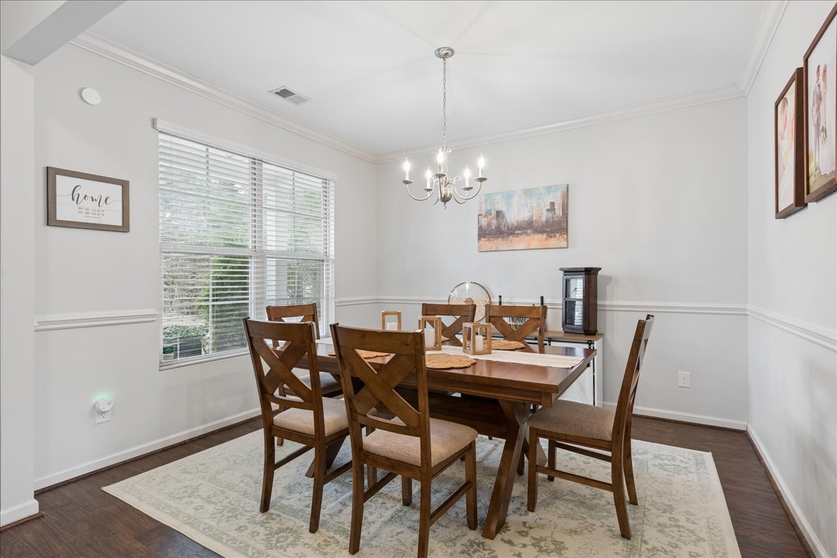 960 Morning Road Antioch, TN 37013 - Photo 6 of 36 a view of a dining room with furniture and wooden floor