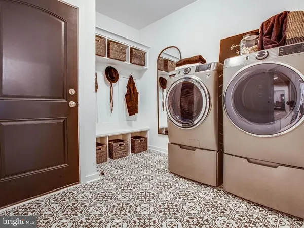 a utility room with dryer and washer