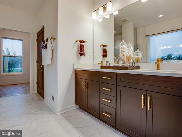 a kitchen with a sink and a refrigerator