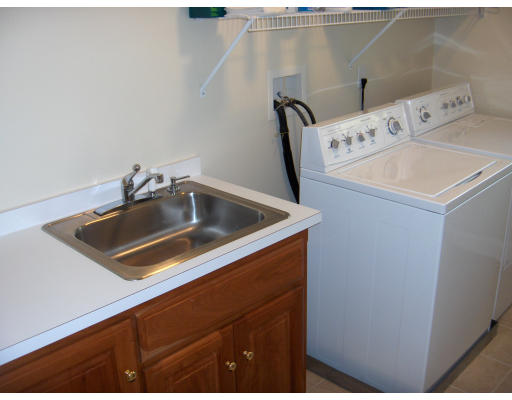 18 Symonds Way Reading, MA 01867 - Photo 18 of 26 a close view of sink and tap