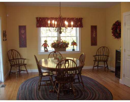 18 Symonds Way Reading, MA 01867 - Photo 5 of 26 a dining room with furniture and window