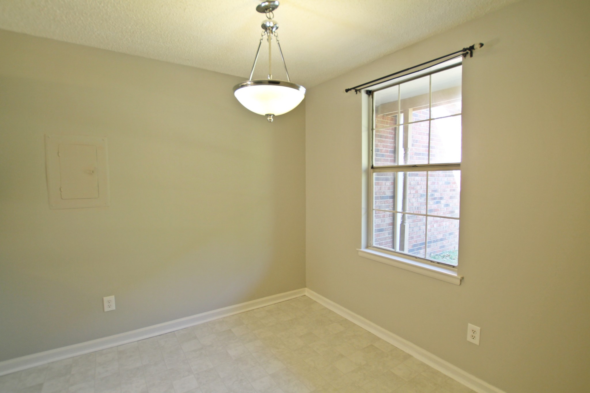 1301 Neelys Bend Road, Unit 91 Madison, TN 37115 - Photo 11 of 33 a view of a room with a window and chandelier fan