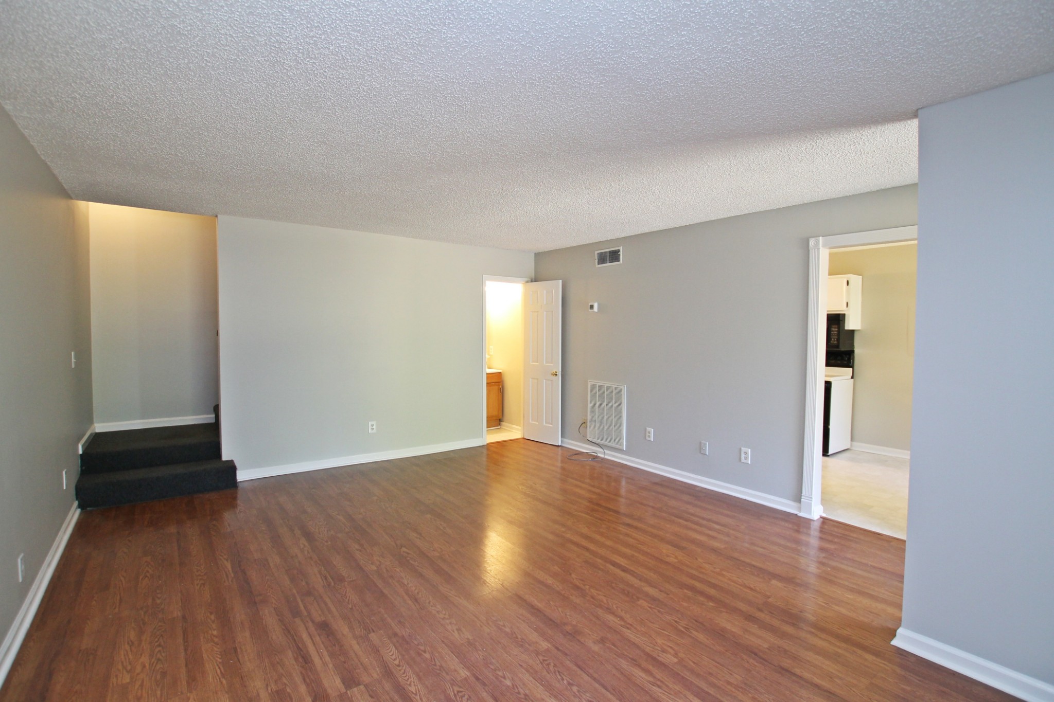 1301 Neelys Bend Road, Unit 91 Madison, TN 37115 - Photo 12 of 33 a view of wooden floor and windows in a room