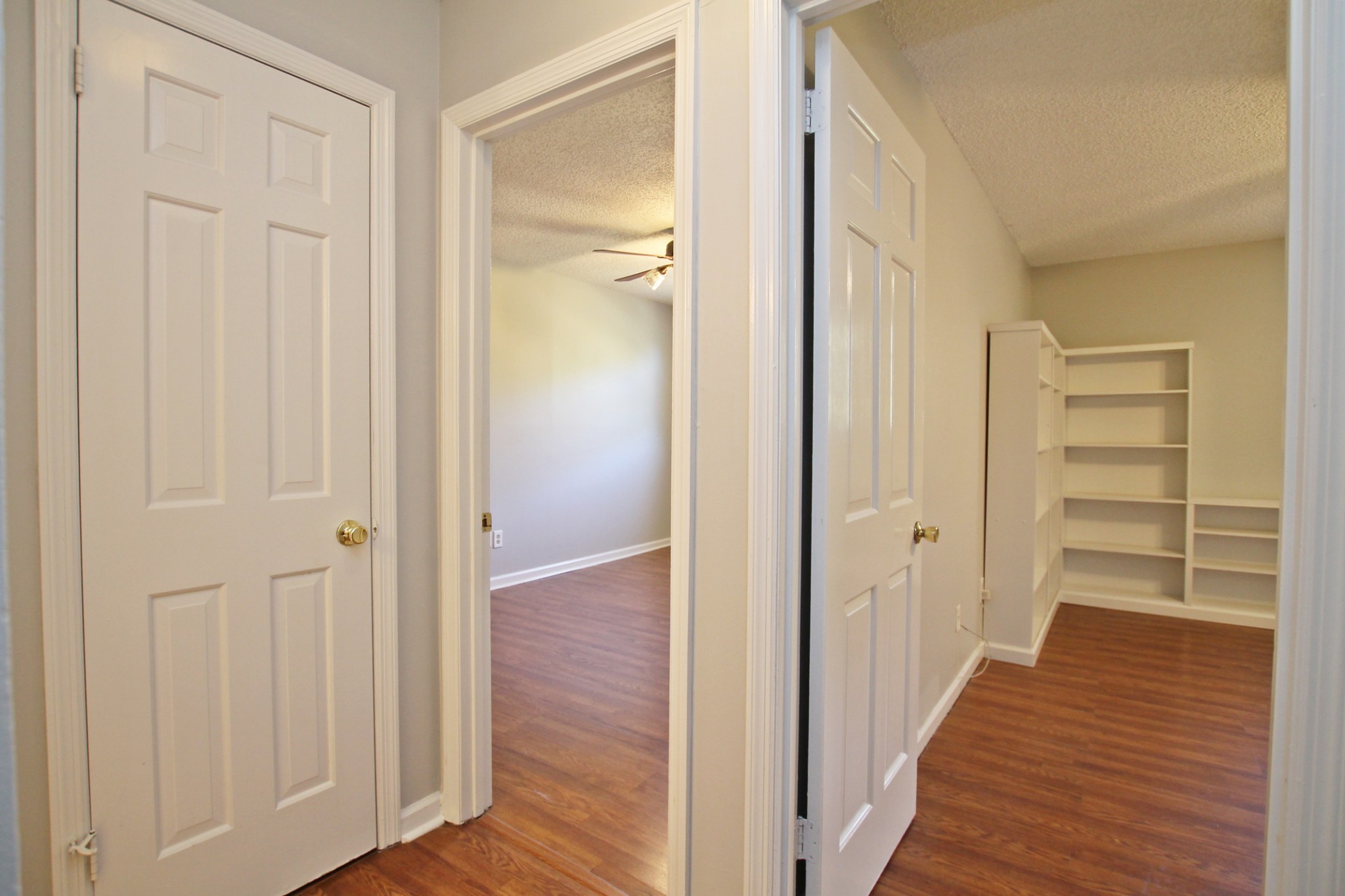 1301 Neelys Bend Road, Unit 91 Madison, TN 37115 - Photo 19 of 33 a view of a hallway with wooden floor and closet area
