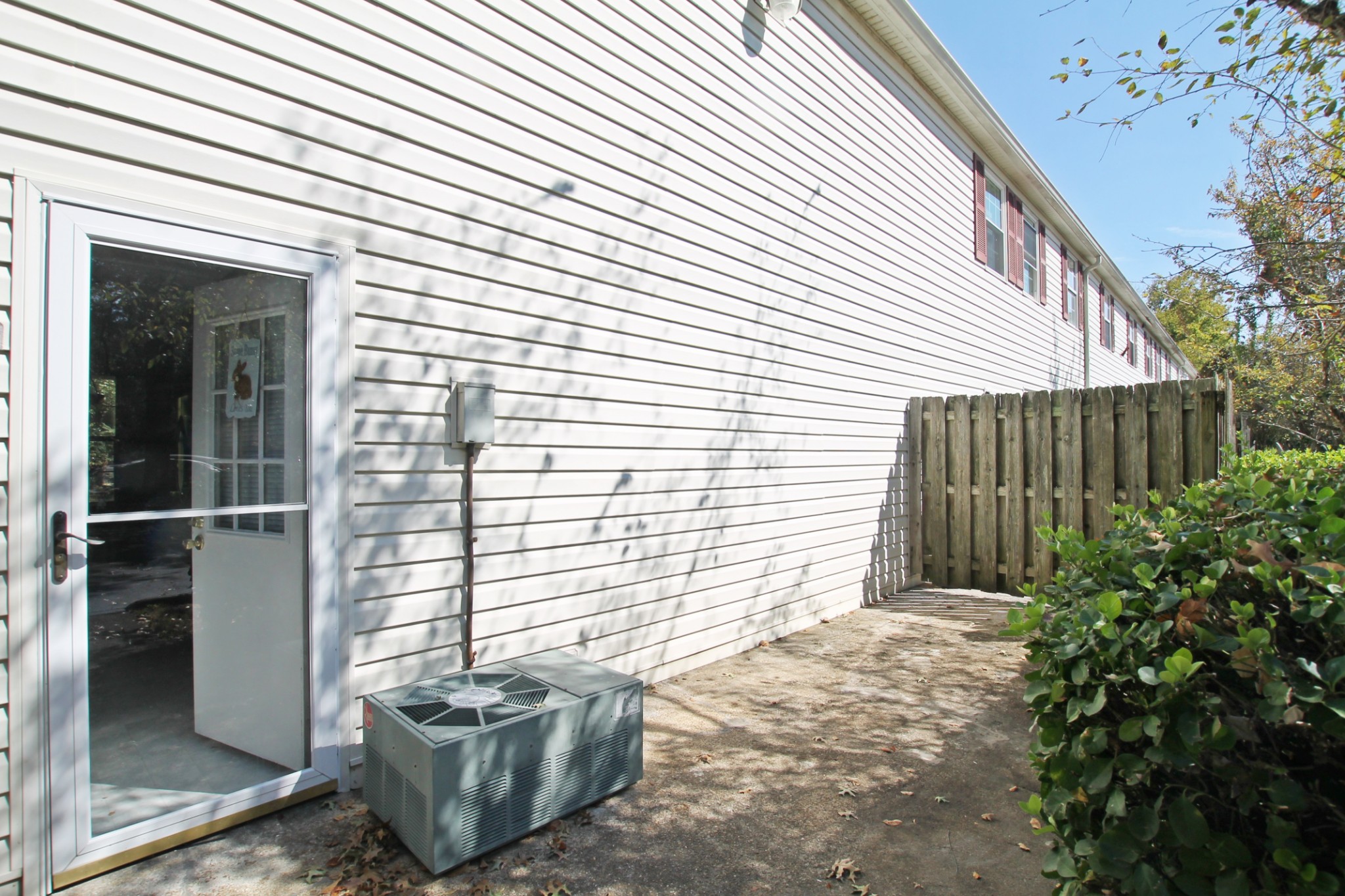 1301 Neelys Bend Road, Unit 91 Madison, TN 37115 - Photo 31 of 33 a view of a backyard with plants