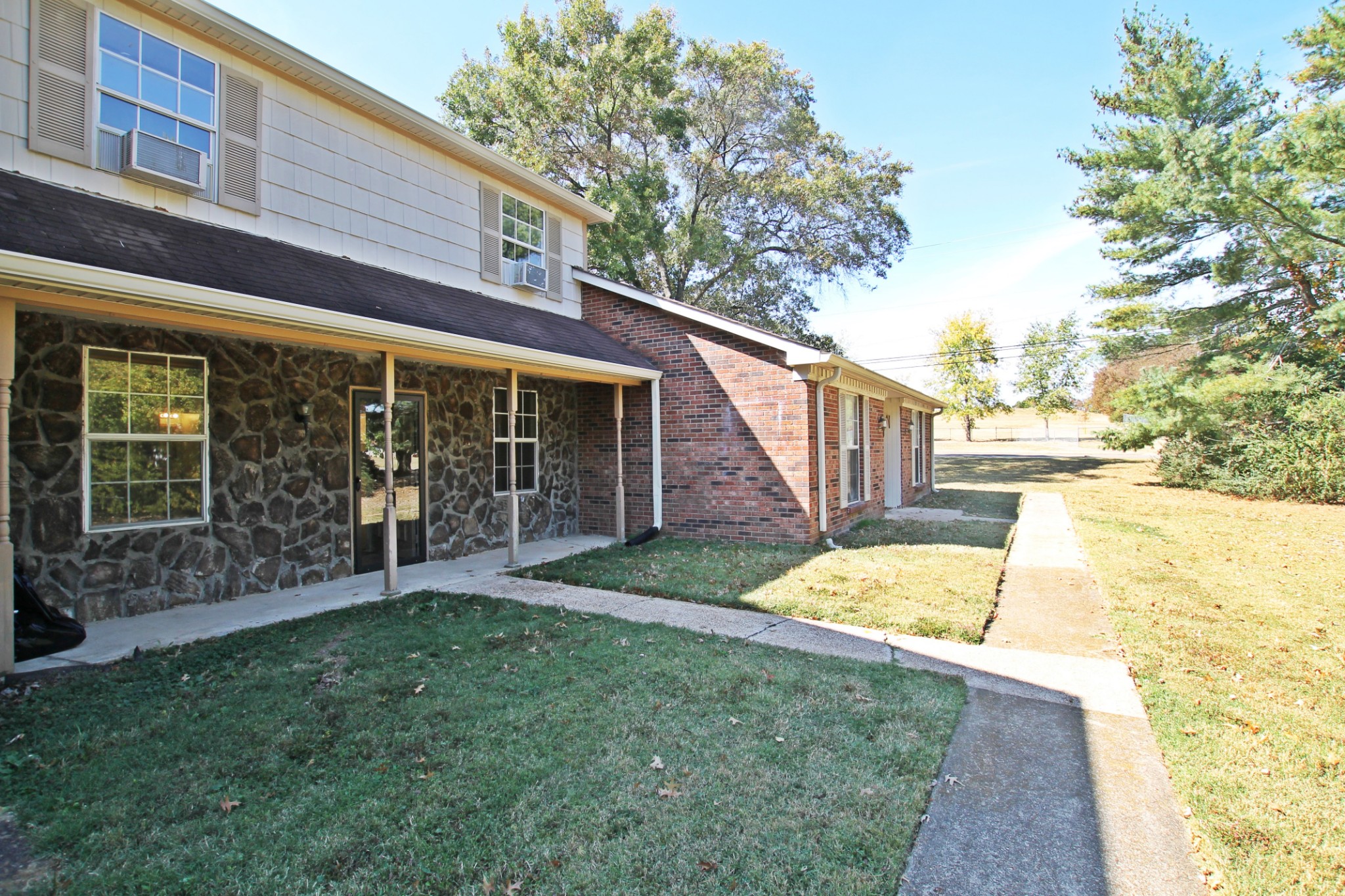 1301 Neelys Bend Road, Unit 91 Madison, TN 37115 - Photo 4 of 33 a view of a house with backyard and porch