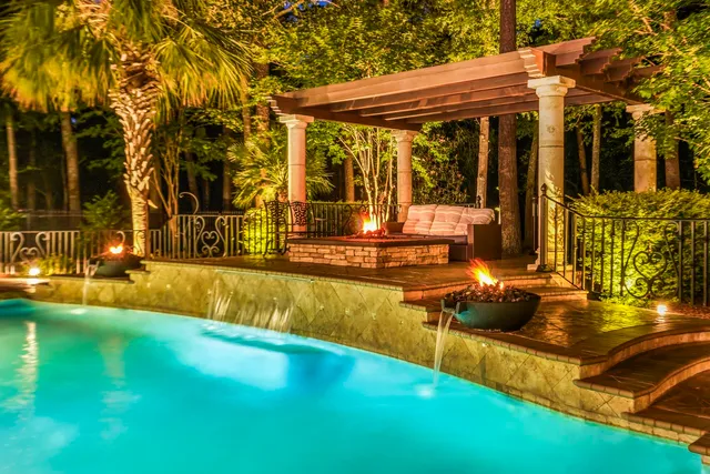 a view of a swimming pool with a patio