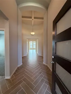 a kitchen with a stove a sink and a refrigerator