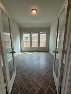 an empty room with windows