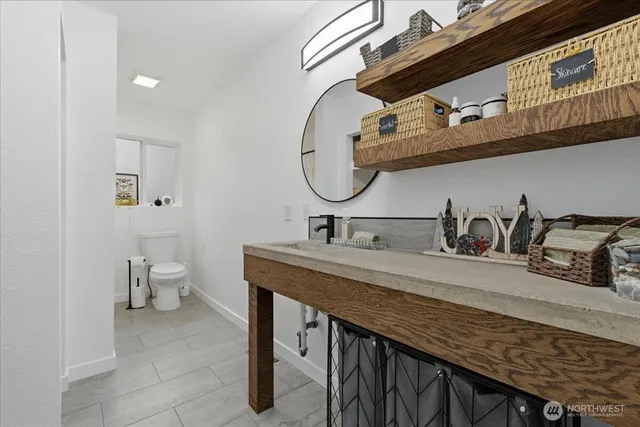 a bathroom with a sink and a toilet