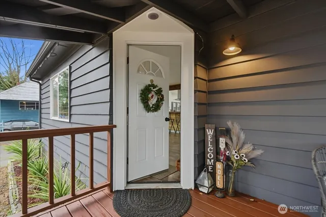 a view of porch with furniture and a potted plant