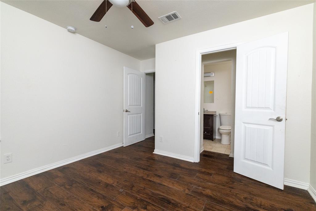 805 East Belt Line Road DeSoto, TX 75115 - Photo 11 of 15 wooden floor in an empty room